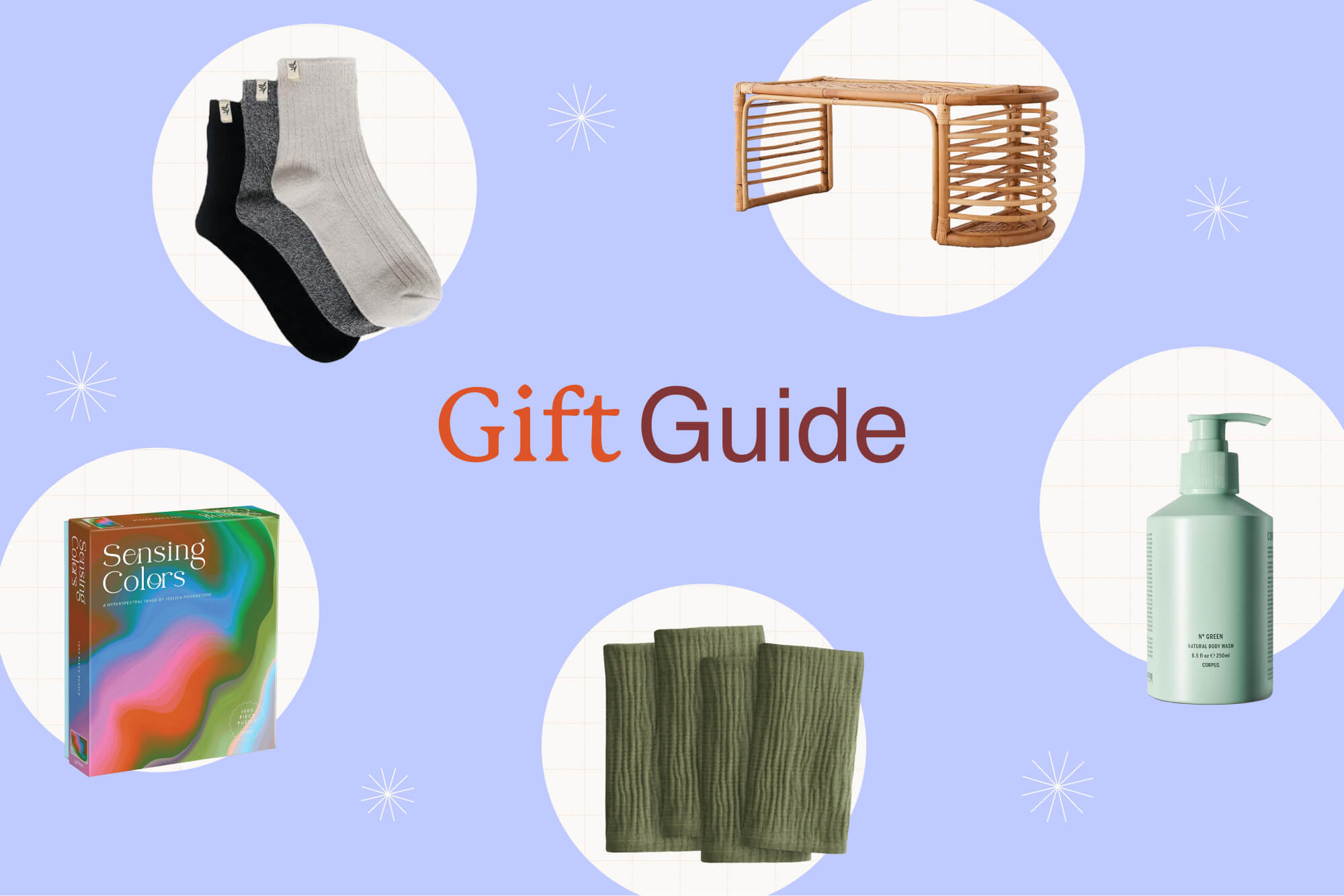 Hero image showing five items in the gift guide, including socks, a puzzle, dinner napkins, body wash, and a bed tray.