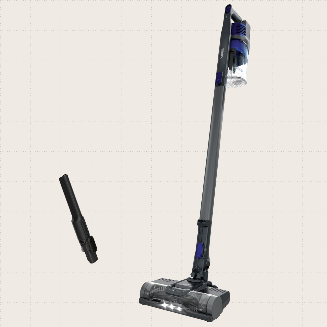 The Shark Pet Cordless Stick Vacuum and the crevice tool attachment against a beige background.