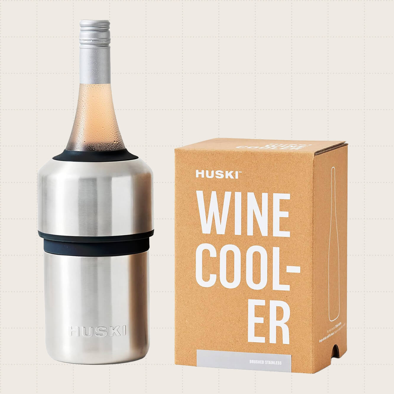 The Huski Wine Chiller in stainless steel, which fits around a bottle of wine to keep it cold for up to six hours.