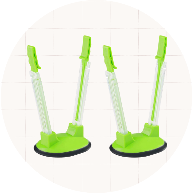 The TAO Cicada Plastic Bag Holders, which are sold in a two-pack, and keep freezer bags open while you put food in them.