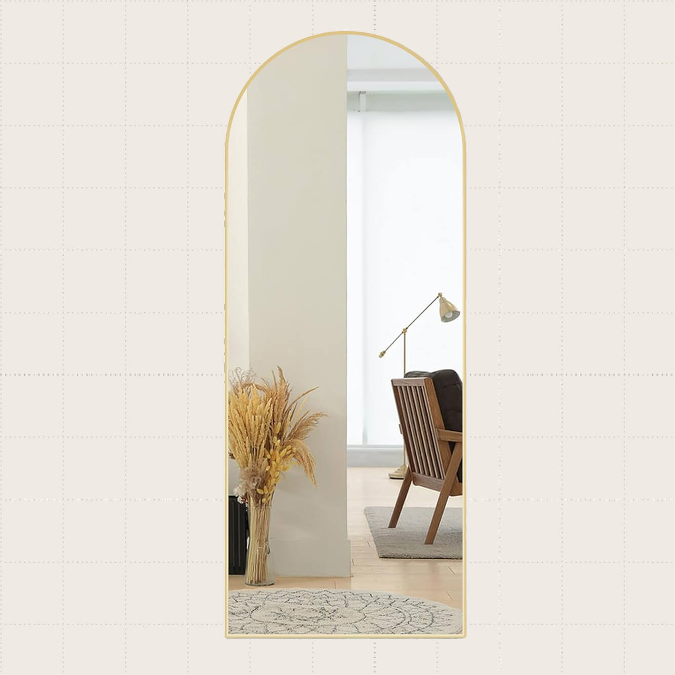 Sweetcrispy 64-by21-inch Arched Full Length Mirror with a gold frame.
