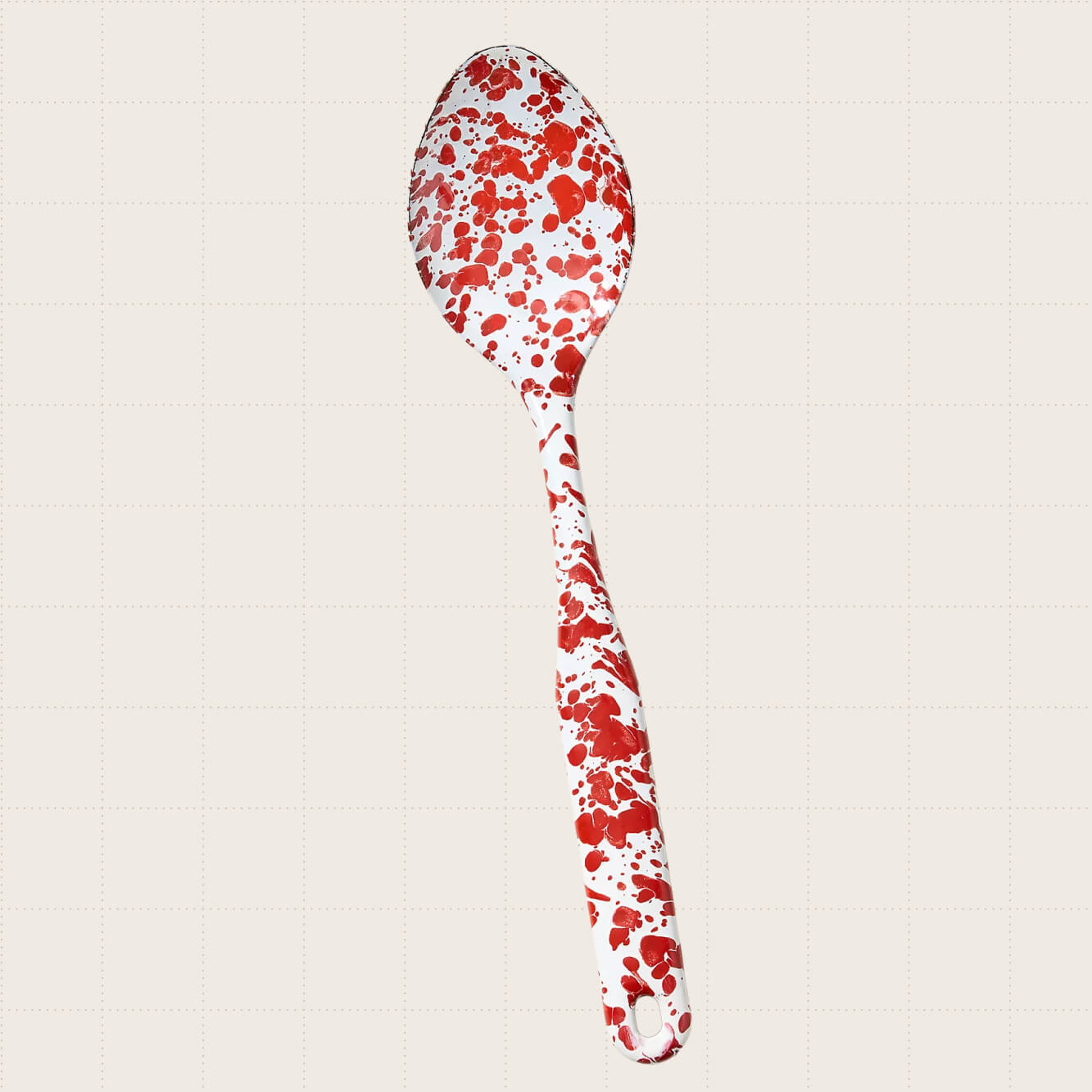 Golden Rabbit Serving Spoon in a white and red speckled finish.